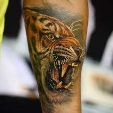 Realistic Color Tiger Portrait Tattoo Made By Giena Revess A Traveling Tattoo Artist Tiger Portrait Tattoo Artists Wildlife Tattoo