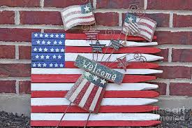 During the day, villages would hold a number of games, pageants, and dances, and many would crown a young woman may queen to preside over the fun. Labor Day Yard Decoration Photograph By Robert Tubesing