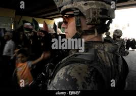 U.S. Army Staff Sgt. Manuel Salais, Iron Training Detachment Senior Air  Assault instructor and Cpl. Alexandra Perez, Iron Training Detachment Air  Assault instructor, perform inverted rappel techniques while U.S. Air Force  Master