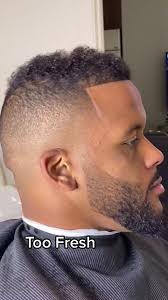 Barber Gives Aaron Donald a Haircut