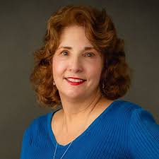 What is the story behind the woman in the picture?