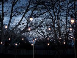 Patio and outdoor lighting ideas to transform your backyard. How To Hang Outdoor String Lights From Diy Posts Hgtv