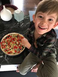 Mad Scientist time... Homemade spinach and artichoke dip, cheese, diced  chicken, and cherry tomato pizza!