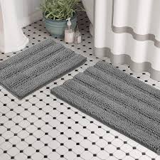 The design of this bath rug creates resistance which secures you from slipping by leaving the bathroom floors dry and clean. Amazon Com Set Of 2 Bathroom Rugs And Bath Mats By Zebrux 20x30 15x23 Set Extra Soft And Absorbent Striped Bath Rugs Set For Indoor Kitchen Rug Light Grey Kitchen Dining