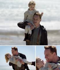 Tom Sherbourne Michael Fassbender Holds The Child Lucy Florence Clery In The Light Between Oceans Michael Fassbender The Light Between Oceans Michael