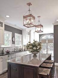 Grey Walls White Cabinets Chrome Fittings Grey Countertop Rose Gold Lanterns Over Walnut Island Kitchen Inspirations Sweet Home Beautiful Kitchens