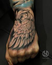 In some cultured people belived that the owl was the guardian and protector of the dead. Hand Owl Tattoo By Freihand Tattoo