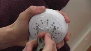 Your goal is to rinse loosened debris out through the opening that connects to the shower arm. How To Clean Your Shower Head Youtube