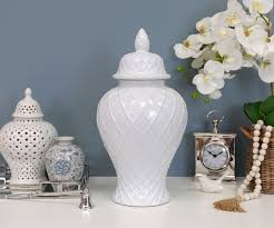 Ginger jars are very appreciated by porcelain collectors who cherish them for their beautiful and ginger jars are mostly identified by their blue and white designs but the fact is that this isn't the the large jar displayed here as a vase features a village scene. Bromley Diamond White Ginger Jar Large