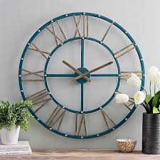 Metal wall art zu spitzenpreisen. Addison Teal And Gold Metal Wall Clock From Kirkland S Teal Wall Decor Gold Wall Decor Metal Wall Clock