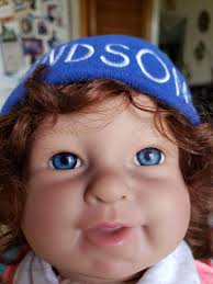 Baby so real brown hair blue eyes