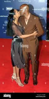 Ex hurdle racer Edwin Mosè arriva con la sua fidanzata Michelle Stranis al  Laureus World Sports Awards Party di Benvenuto a Barcellona, Spagna,  domenica 21 maggio 2006. Eccezionali atleti riceveranno il Laureus