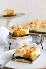 Ofen auf 200° vorheizen, form fetten, mit bröseln bestreuen. Kasekuchen Mit Mohn Und Pfirsichen