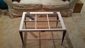 This striking wooden coffee table exudes a rugged charm that will make it a distinctive addition to your living room or bedroom. Window Table With Tapered Angle Iron Legs Modern Legs