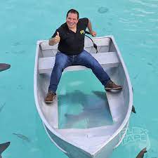 Happy Shark Week Here S A Picture From When Philswiftontv Rode The Flex Tape Clear Boat With Sharks Flex Tape Memes Phil Swift Happy Shark