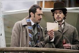 Sherlock holmes is a consulting detective, who at one time became a wanted fugitive in his hunt for lord blackwood, while constantly being followed by the presence of professor moriarty. Robert Downey Jr Jude Law Talk Sherlock Holmes On The Set Los Angeles Times