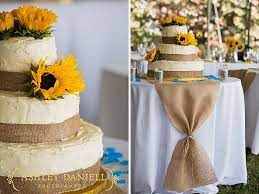 Burlap And Sunflower Beach Themed Wedding In Longboat Key Sarasotawedding Longboatkeywedding Outdoorw Sunflower Wedding Wedding Cake Table Sunflower Cakes