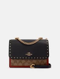 Klare Crossbody In Signature Canvas With Rivets In 2021 Signature Canvas Coach Bags