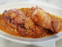 Ecco, davanti a questa parola io mi sciolgo. Calamari Ripieni Al Sugo Pescheria Belfish