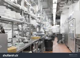 With wood table for display product. Empty Restaurant Kitchen Is Blurred For Background Royalty Free Image Photo Restaurant Kitchen Kitchen Background Restaurant
