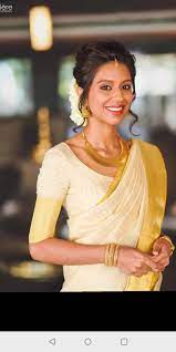 Pin By Amrutha Yogarajah On Hair And Makeup Bridal Hairstyle Indian Wedding Bridesmaid Saree Kerala Wedding Saree