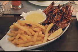 اسبح في عالم من الأسماك بأنواعها مقلية ومشوية في مطعم سمكتي بالرياض مدينة الرياض