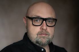 Jerry Crowell dreams big for his crumbling pink building