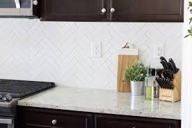 A while back meg did this fabulous post on covering your backsplash with beadboard wallpaper yep wallpaper. Herringbone Subway Tile Backsplash Reveal Okayest Moms