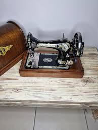 Image result for singer 28k