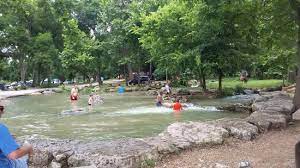 I called them and was told that on each spot of the campgrounds for 2 tents, 4 cars were $30 dollars. Right By The Bridge To The Grounds Picture Of Camp Huaco Springs New Braunfels Tripadvisor