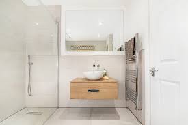 Many new wet rooms include a shower space and freestanding tub in their own glass enclosure separate from the sink and toilet areas. Bathroom Fitters Wakefield Disabled Wet Rooms Batley