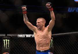 T j dillashaw is the popular american mixed martial artist and bantamweight champion who is known for combining different fighting styles and techniques in his kickboxing, bang muay thai, and wrestling. T J Dillashaw Wife Rebecca Dillashaw Height Net Worth Other Facts Networth Height Salary