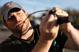 Will Rumford, Ryan Rumford and Andrew Rumford build a bicycle at the  Richmond Area Bicycling Association (RABA) Big Bikes for Kids build event  during the