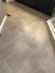 Finally, you must always put a grout sealer on. Skybridge 12x24 Gray Floor Tile Installed Brick Joint Tile Floor Tile Installation Flooring