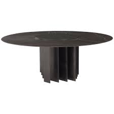 Any of our dramatic black dining tables will be sure to impress your designer friends. Exilis Round Dining Table With Black Metal Feet And Marble Top By Amura Lab Metal Dining Table Coffee And Cocktail Tables Table