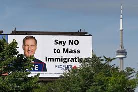 A billboard featuring the portrait of people's party of canada leader maxime bernier and its message say no to mass immigration is displayed in toronto, on sunday, aug. Anti Immigration Billboards Across Canada Taken Down After Backlash Reuters Com