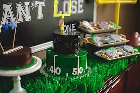 This giant football sign is the perfect backdrop for your dessert or buffet table at your football party! Kara S Party Ideas Football 1st Birthday Party Kara S Party Ideas