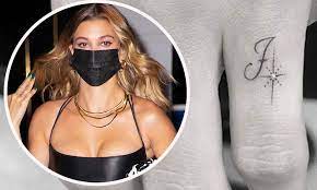 1 she indeed has over 20 tattoos. Hailey Bieber Gets Wedding Ring J Tattoo In Honor Of Year Long Marriage To Justin Bieber Daily Mail Online