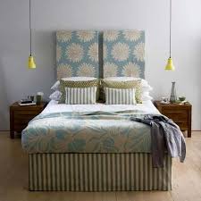 A cheerful floral and dragonfly fabric brightens up an elegant headboard. Decor Unique Headboard Modern Designs Elegant Bedroom Headboard Designs Bedroom Design
