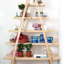 Transform a ladder into a shelving unit. 11 Ways To Decorate With Vintage Ladders