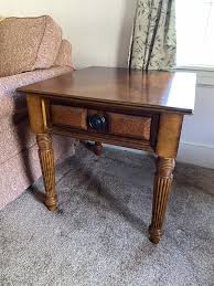 Here, your favorite looks cost less than you thought possible. Broyhill End Table Cherished Possessions