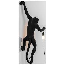 Monkey lamps have a strong theatrical impact in which art, design and the world of nature blend together creating magical products. Seletti Monkey Hanging Left Outdoor Lamp Black