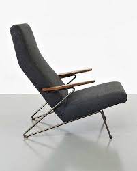 koene oberman enameled iron and oak lounge chair for meubelindustrie gelderland bv 1956 vintage lounge chair lounge chair design chair