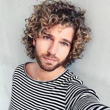 Men with curls should rejoice for this 'do because curls maximize the volume of a side part and lend well to the vintage aesthetic this hairstyle brings with it. 96 Curly Hairstyles Haircuts For Men 2021 Edition