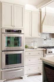 Don't get us wrong—we love a white kitchen. Popular Paint Color And Color Palette Ideas Home Bunch An Interior Design Luxury Homes Blog Greige Kitchen Ivory Kitchen Kitchen Remodel