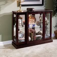 A curio is a small object that's unusual, novel, or interesting, typically one that's part of a collection of other such objects. Small Glass Curio Cabinet Display Case Ideas On Foter