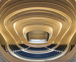Complex Oak Curvilinear Interior In Hadid Concert Hall Zaha Hadid Zaha Hadid Architecture Zaha Hadid Architects