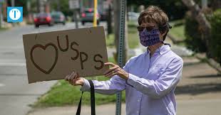 Local group holds rally to support USPS workers