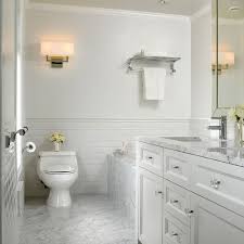White Vanity With Marble Top Marble Floor And Subway Tile On Walls Simple And Elegant White Marble Bathrooms Traditional Bathroom Bathroom Tile Designs
