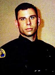 Manhunt for suspect in cop killing